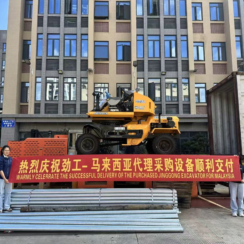 Jinggong et l'agent malaisien ont finalisé la livraison de la chargeuse 100CW.